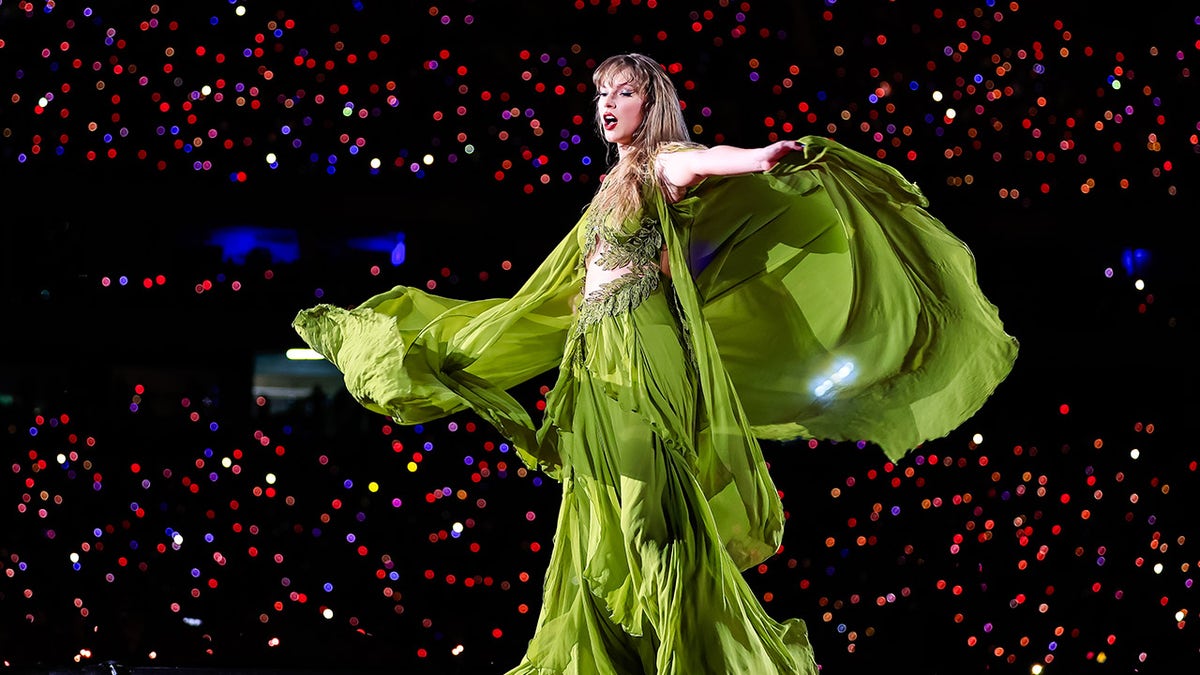 Taylor Swift wears bright green dress on stage in Brazil