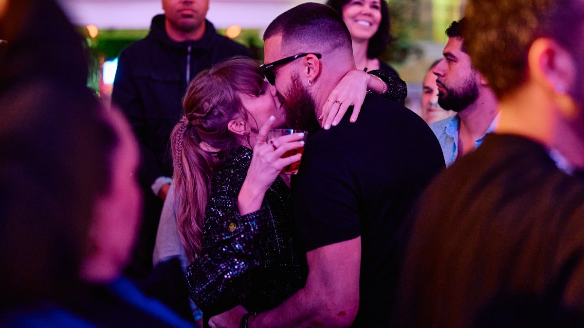 Taylor Swift and Travis Kelce kissing at Super Bowl after party