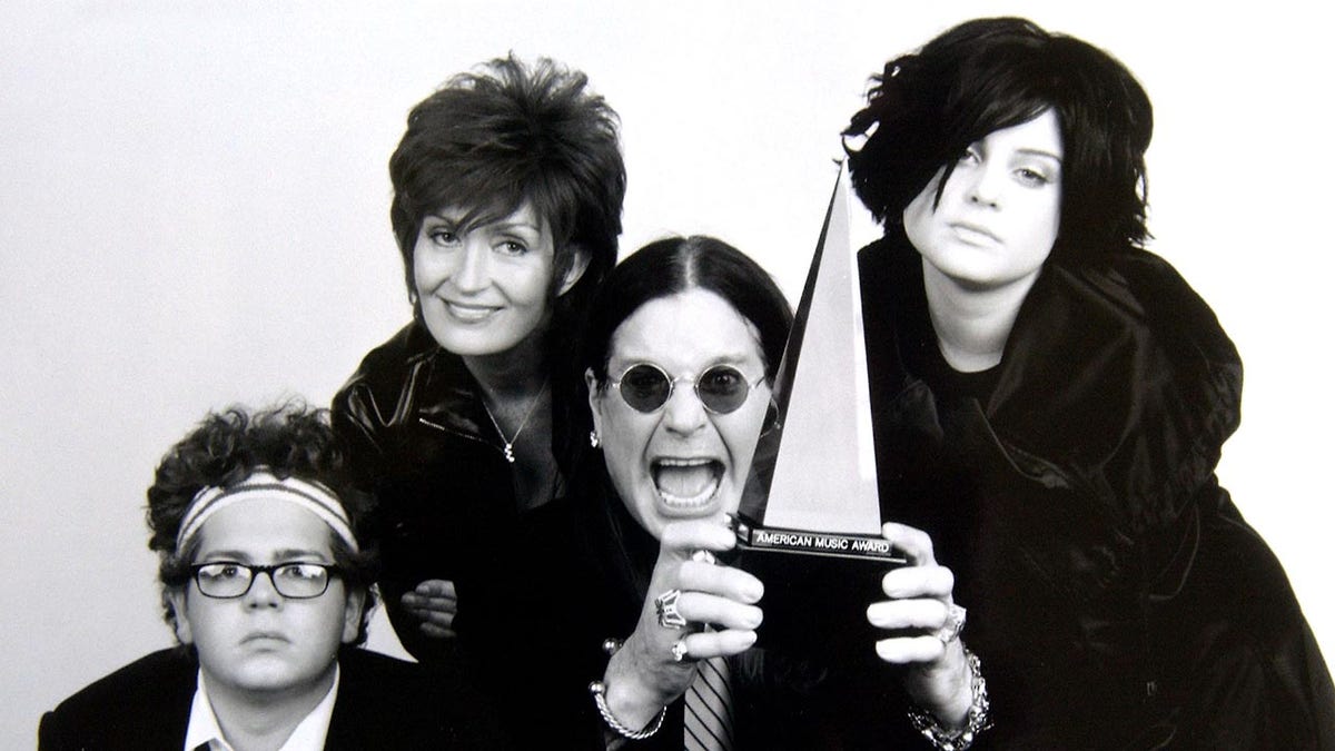 Ozzy, Sharon, Jack and Kelly posing for a promotional photo
